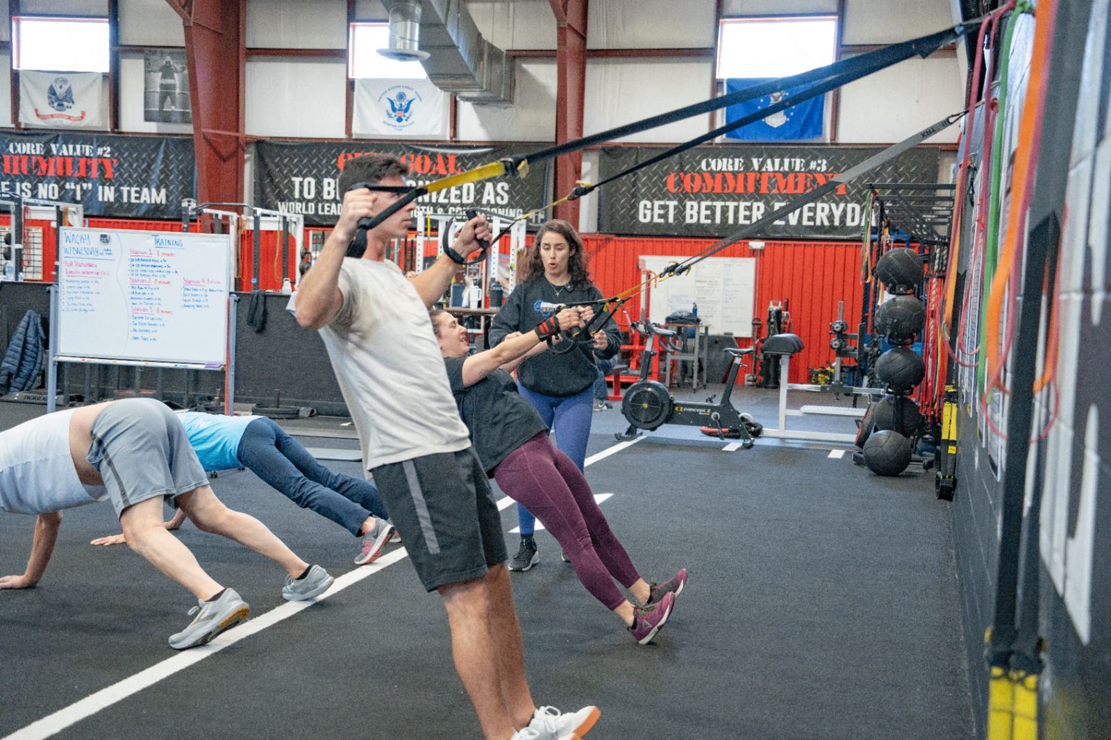 Varsity House Gym members celebrating after a coached session
